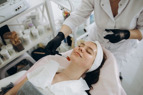 Chemical peels for wrinkles, woman getting a chemical peel treatment.